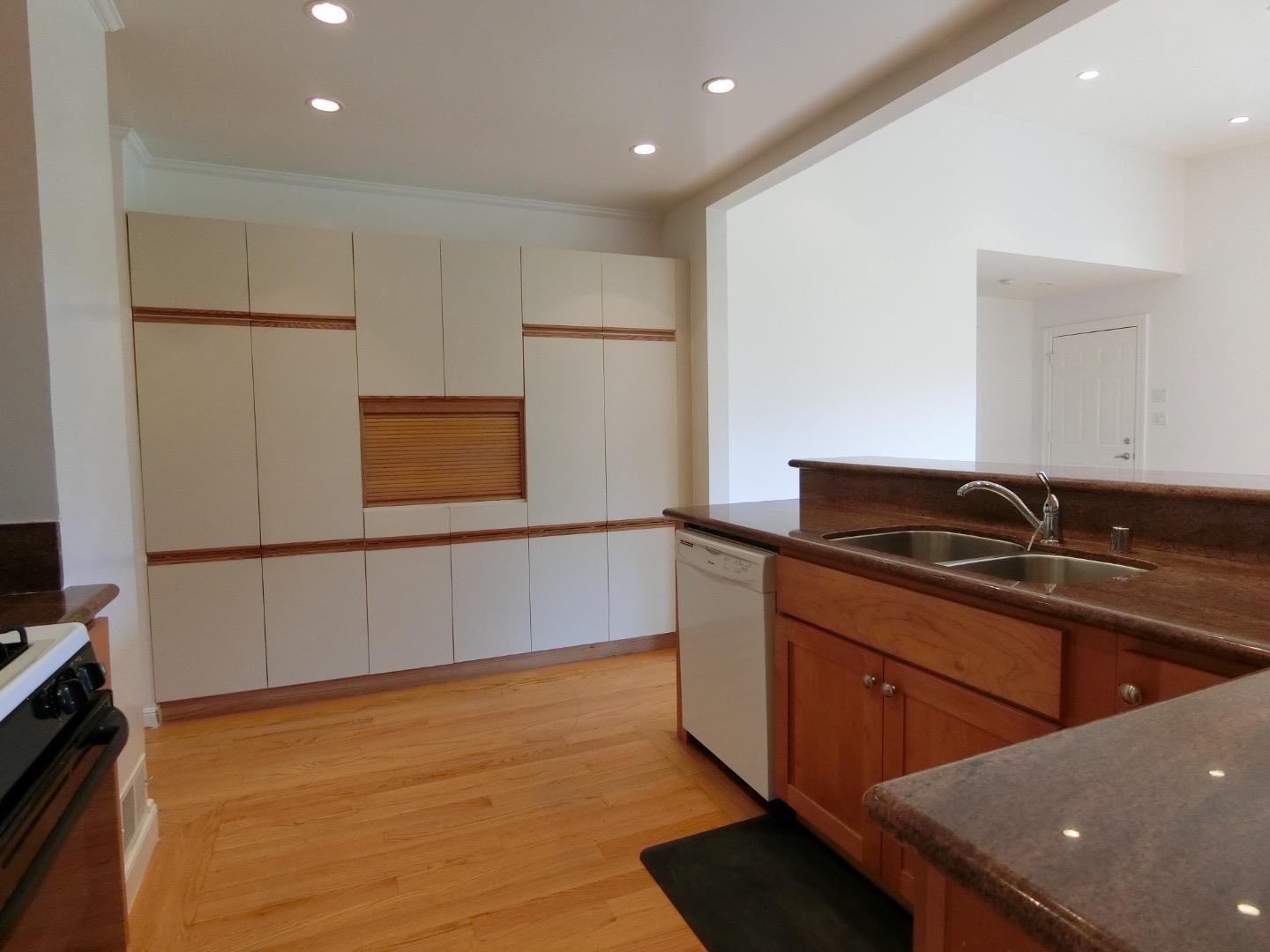 339 Paramount Drive Millbrae, CA 94030 - Photo 3 of 14 a kitchen with stainless steel appliances granite countertop a sink and a stove