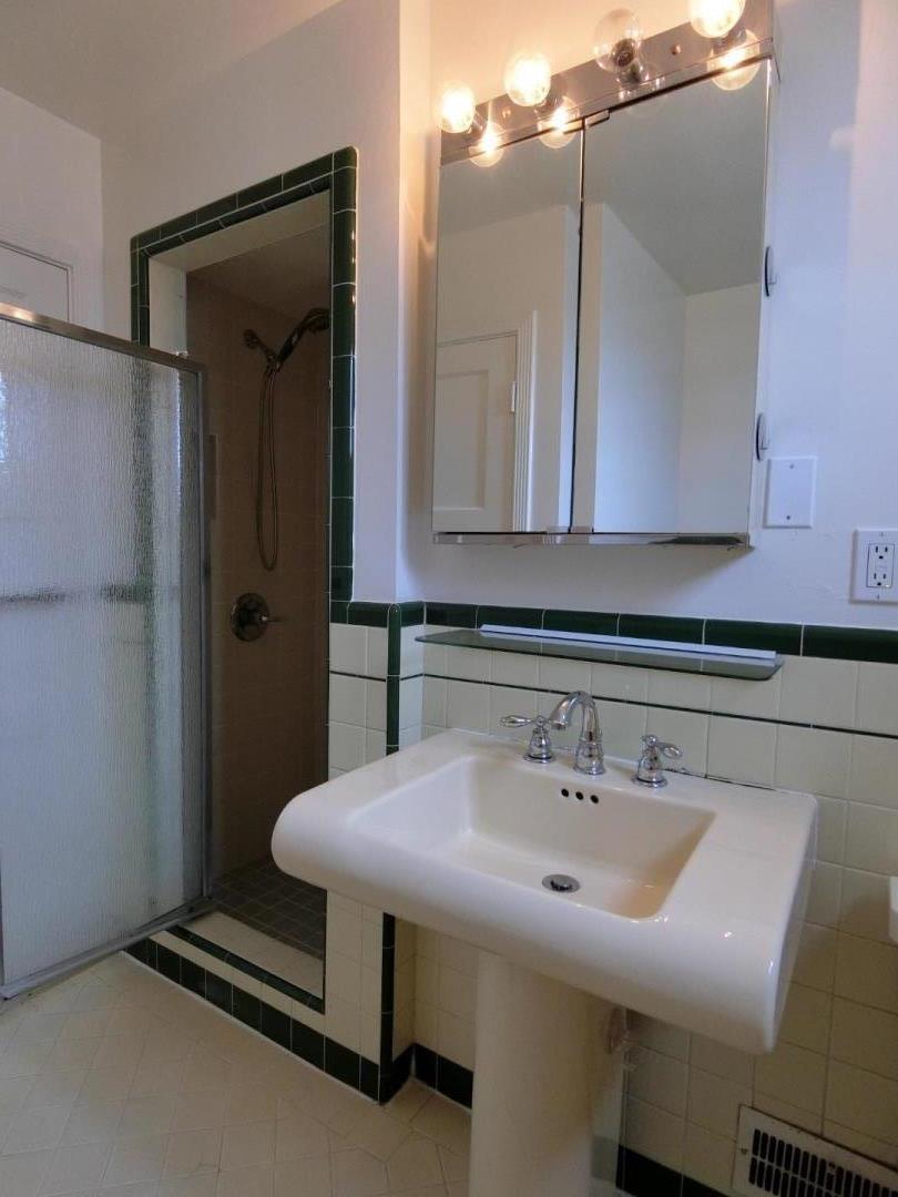 339 Paramount Drive Millbrae, CA 94030 - Photo 7 of 14 a bathroom with a sink and a mirror