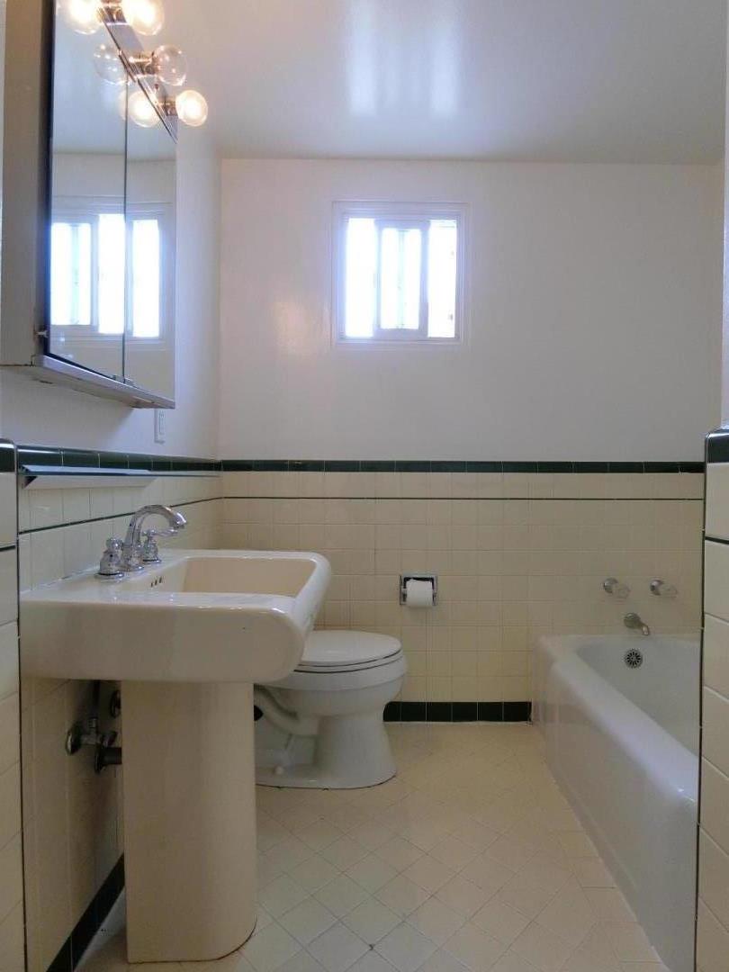 339 Paramount Drive Millbrae, CA 94030 - Photo 8 of 14 a bathroom with a sink a toilet and bathtub
