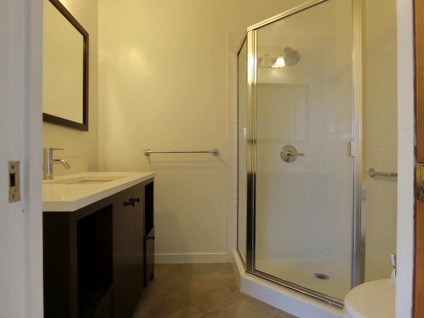 339 Paramount Drive Millbrae, CA 94030 - Photo 9 of 14 a bathroom with a sink and a mirror
