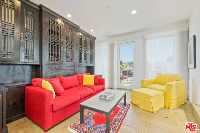 a living room with furniture and a couch