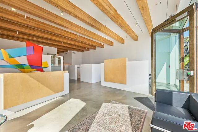 a view of kitchen with furniture and window