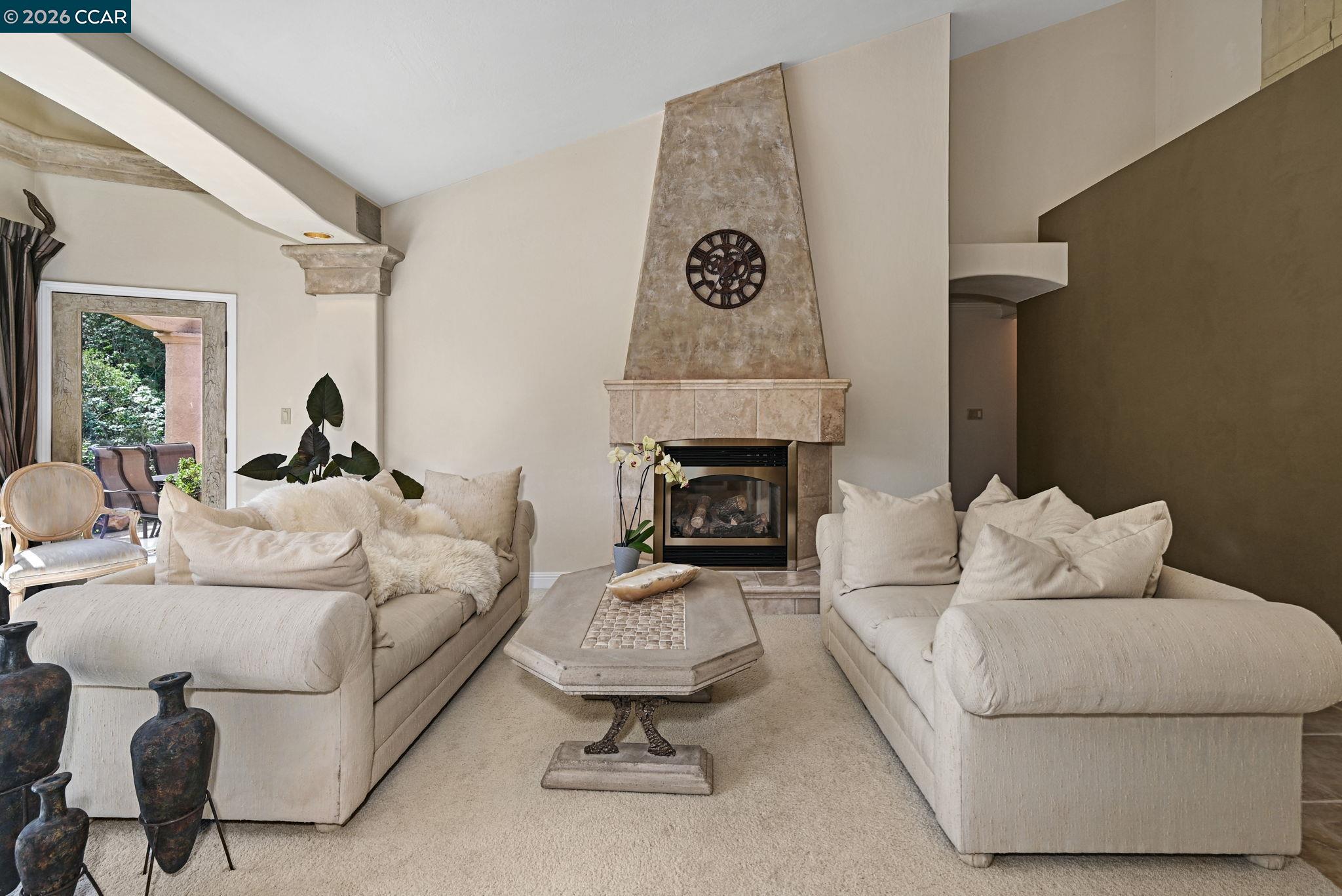 490 St Marys Road Lafayette, CA 94549 - Photo 11 of 61 a living room with furniture and a fireplace