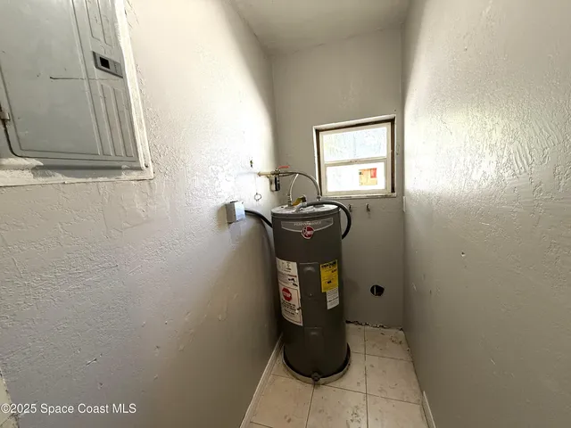 a view of a porch with a trees back yard