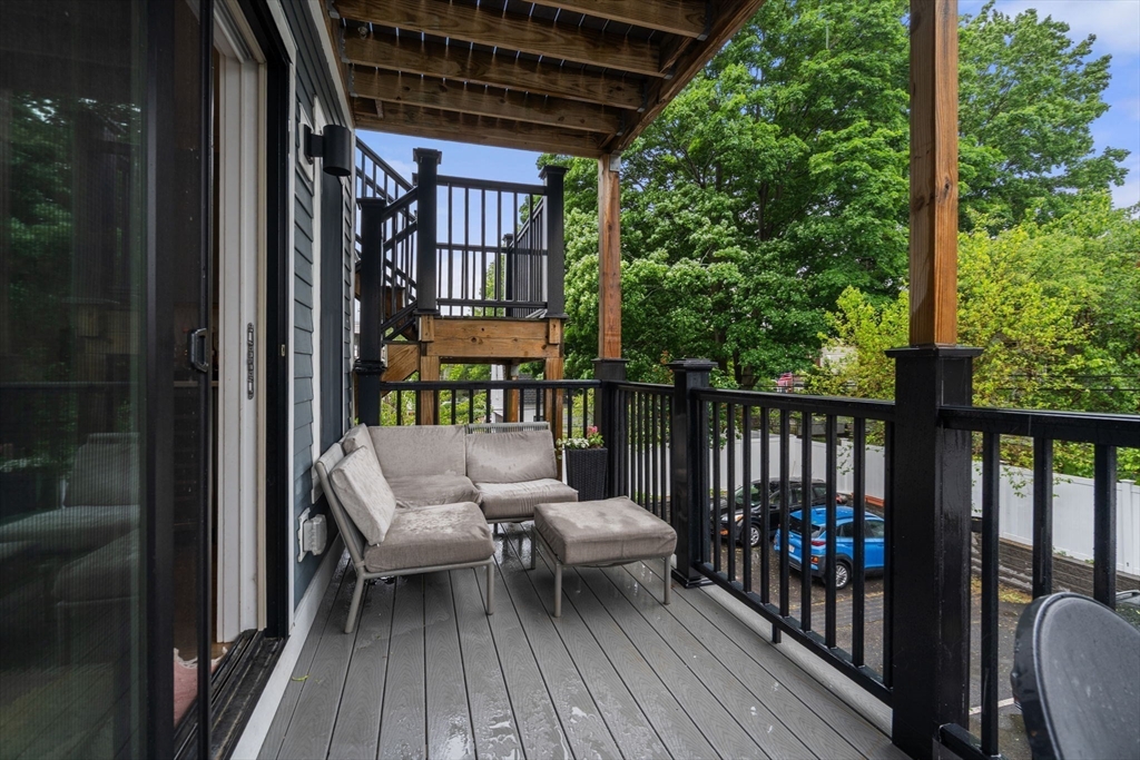 654 East 7th Street, Unit 3 Boston, MA 02127 - Photo 13 of 28 a view of a balcony with furniture