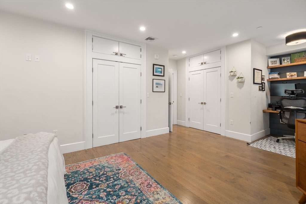 654 East 7th Street, Unit 3 Boston, MA 02127 - Photo 17 of 28 a view of a livingroom with kitchen appliances and furniture