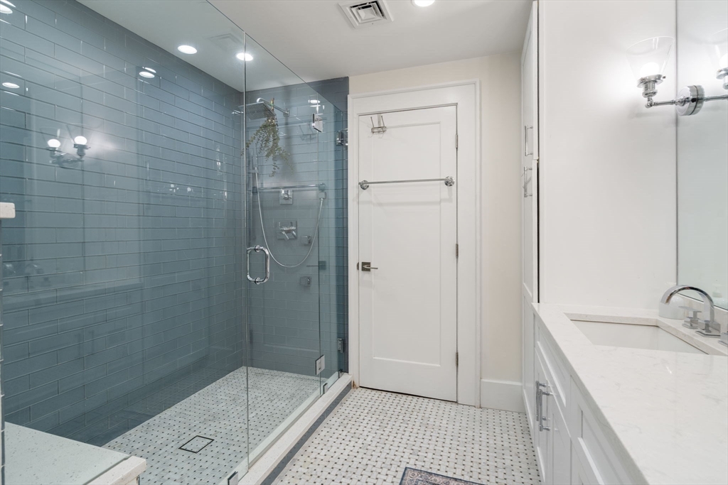 654 East 7th Street, Unit 3 Boston, MA 02127 - Photo 19 of 28 a bathroom with a shower and a sink