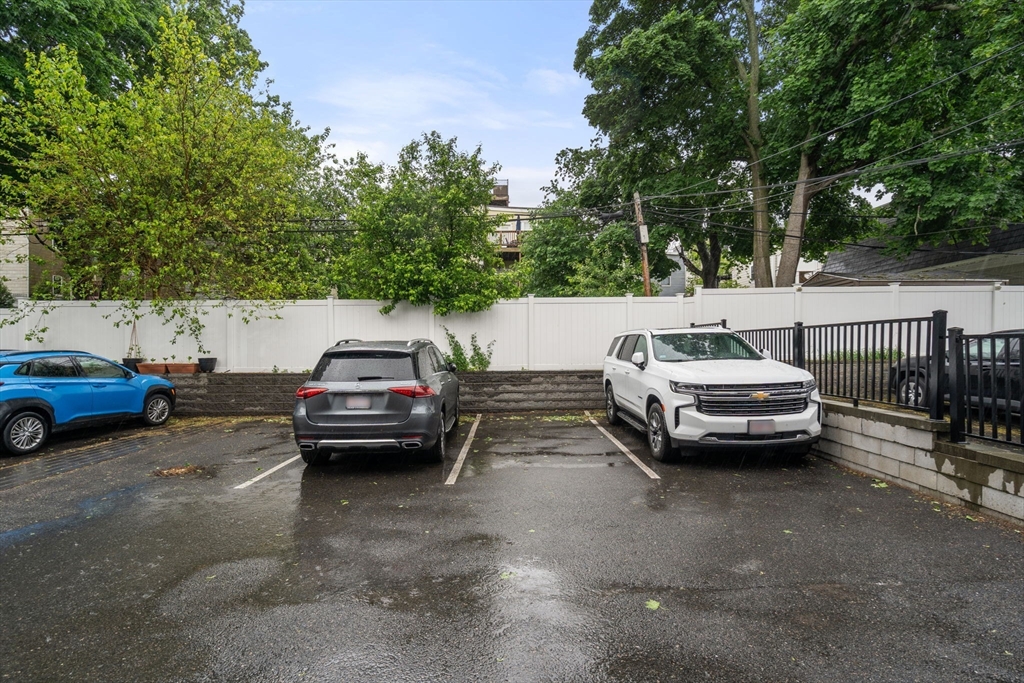 654 East 7th Street, Unit 3 Boston, MA 02127 - Photo 27 of 28 a car parked in the parking lot of a cars