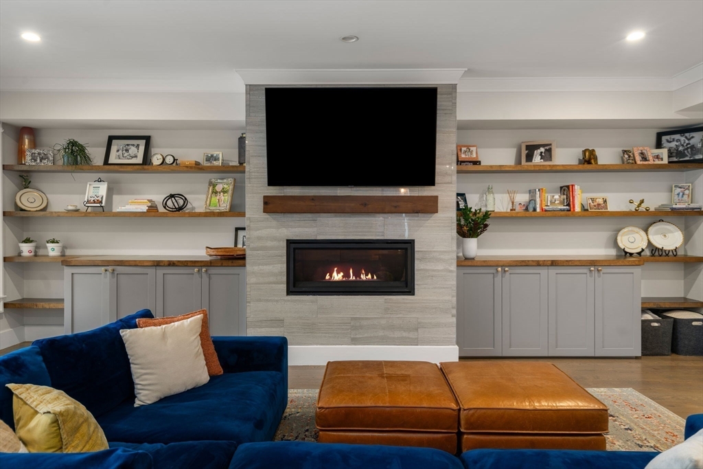 654 East 7th Street, Unit 3 Boston, MA 02127 - Photo 6 of 28 a living room with furniture and a flat screen tv
