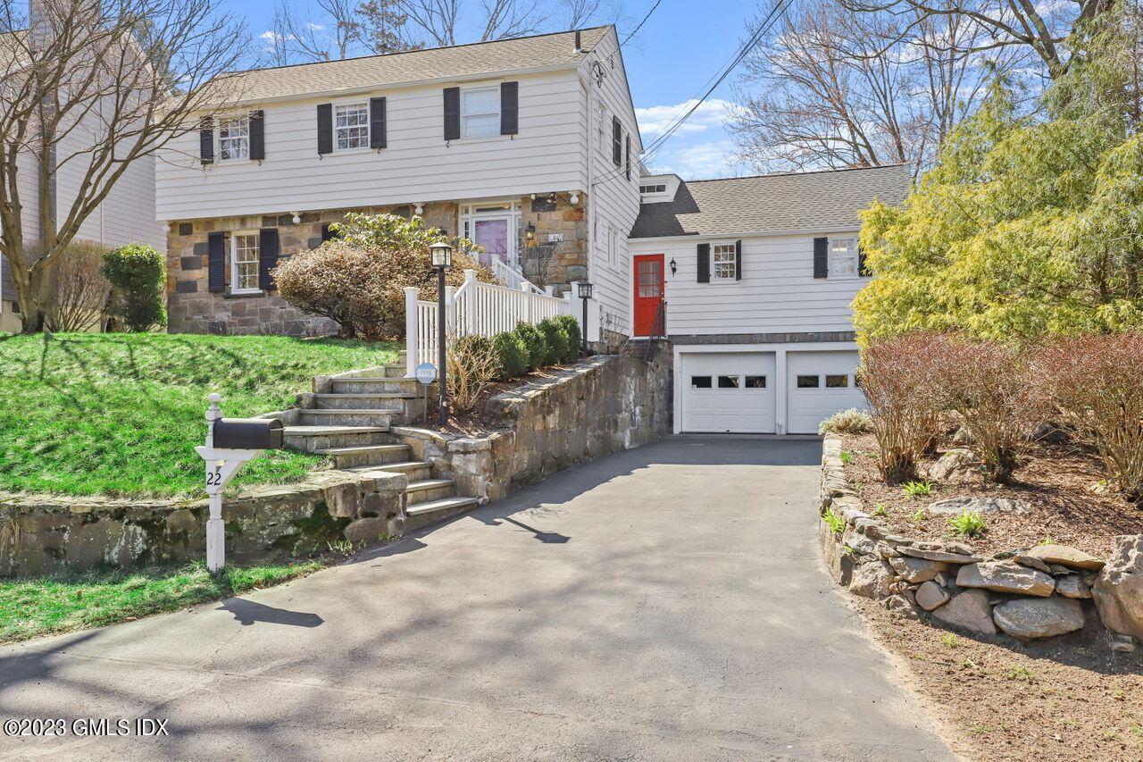 22 Linwood Avenue Riverside, CT 06878 - Photo 2 of 37 a front view of a house with a garden