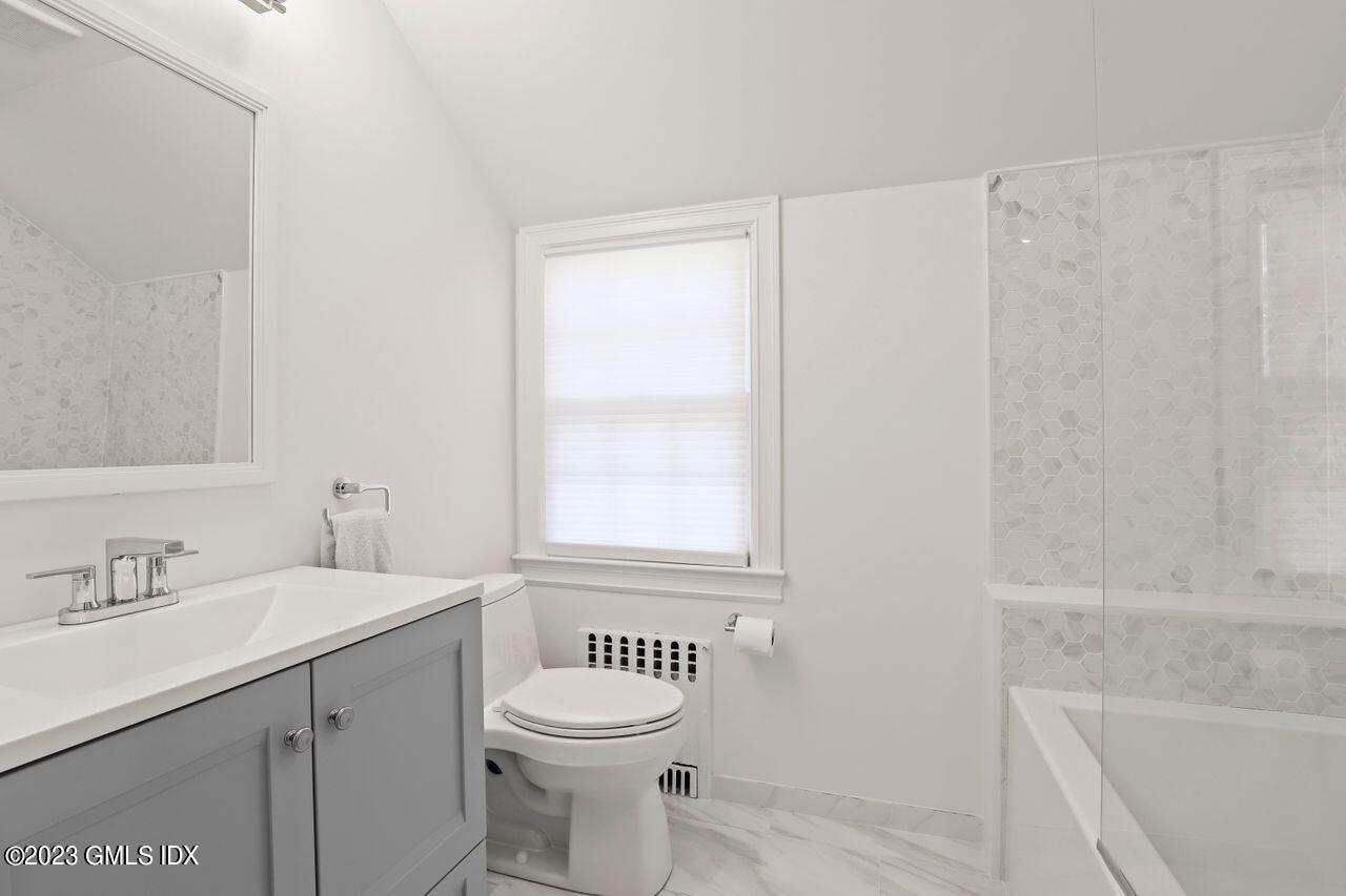 22 Linwood Avenue Riverside, CT 06878 - Photo 26 of 37 a bathroom with a sink a toilet and a bathtub