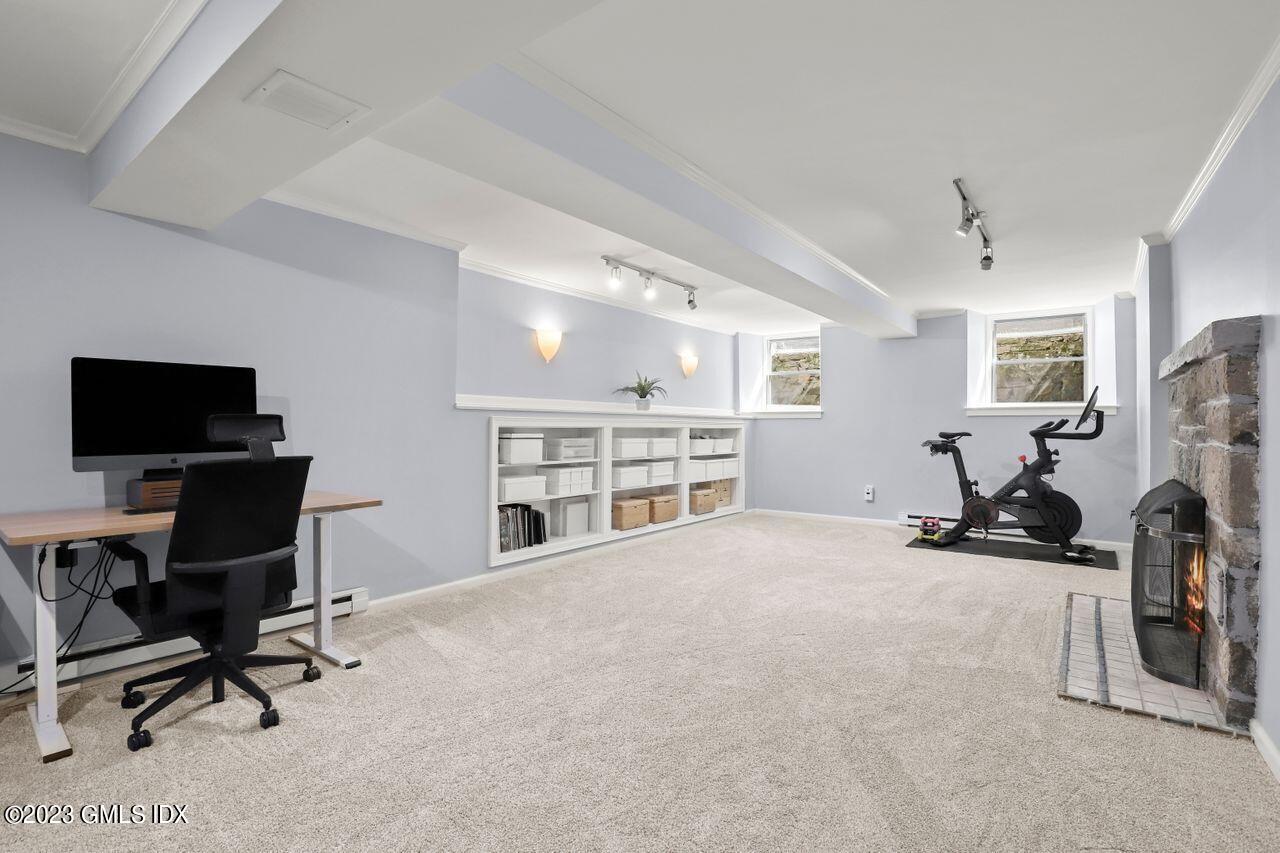 22 Linwood Avenue Riverside, CT 06878 - Photo 27 of 37 a view of a livingroom with workspace and a window