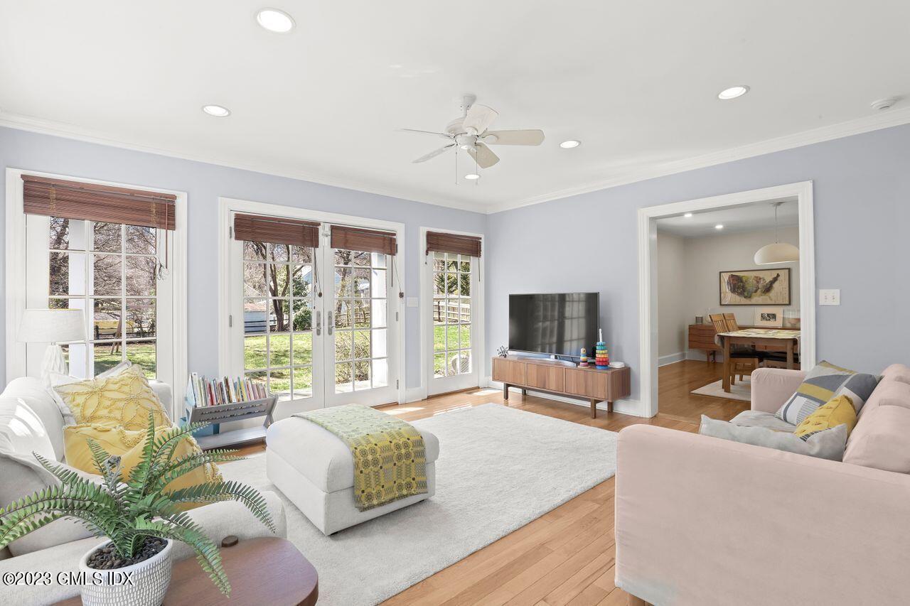 22 Linwood Avenue Riverside, CT 06878 - Photo 7 of 37 a living room with furniture and a large window