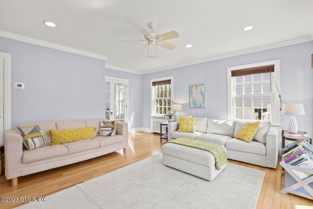 22 Linwood Avenue Riverside, CT 06878 - Photo 8 of 37 a living room with furniture and a large window