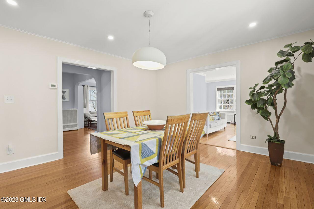 22 Linwood Avenue Riverside, CT 06878 - Photo 9 of 37 a view of a dining room with furniture and wooden floor