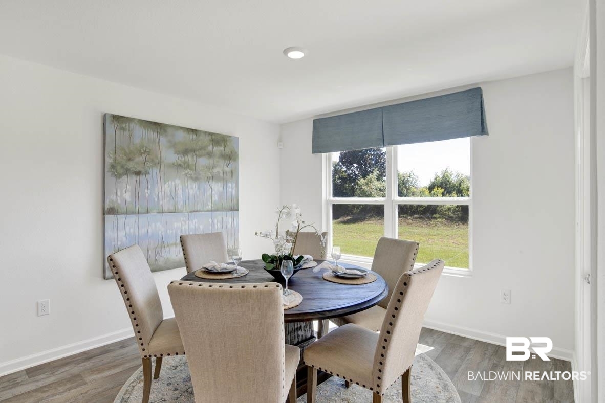 8880 Sea Star Circle Foley, AL 36535 - Photo 16 of 67 Dining room with dark wood-type flooring