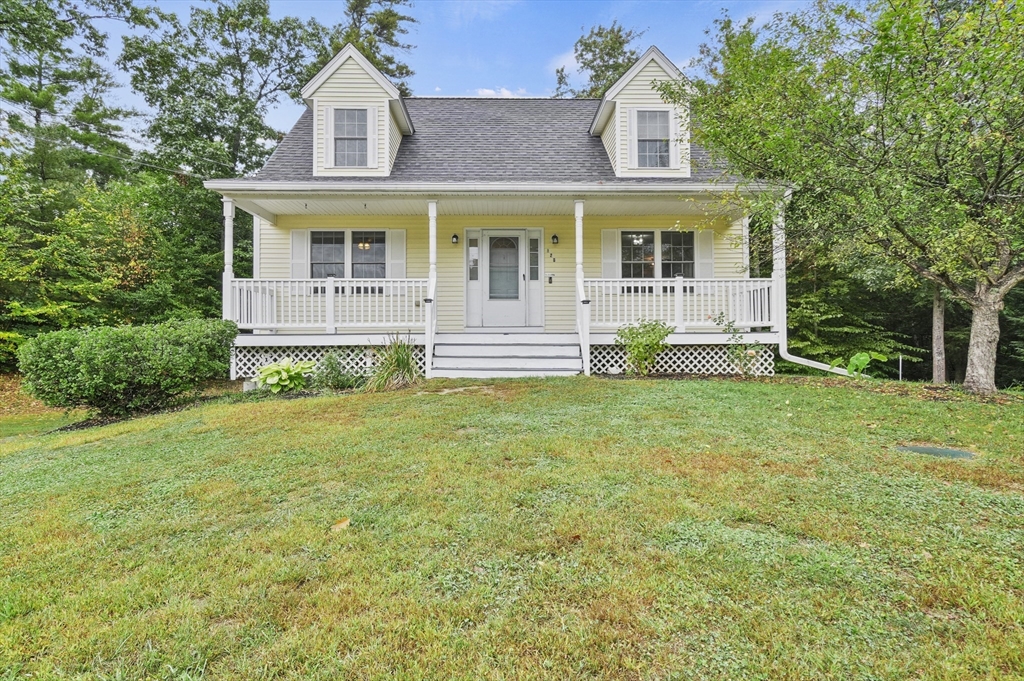 front view of house with a yard