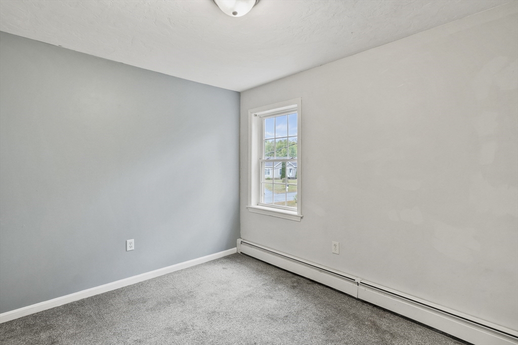 128 Green Farm Road New Ipswich, NH 03071 - Photo 26 of 39 an empty room with a window
