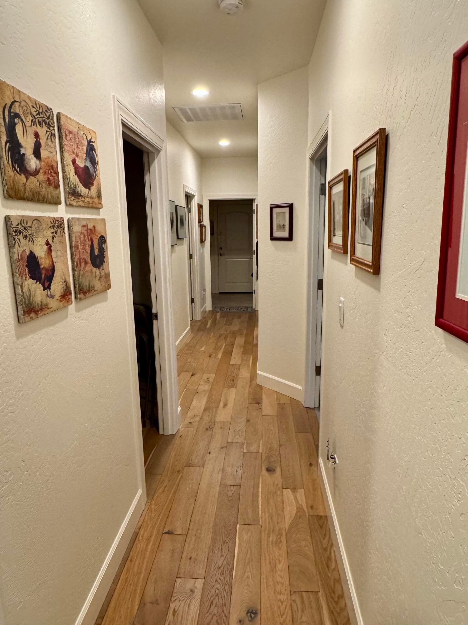438 Cheney Loop Central Point, OR 97502 - Photo 7 of 15 Hardwood floors running thru the hallway