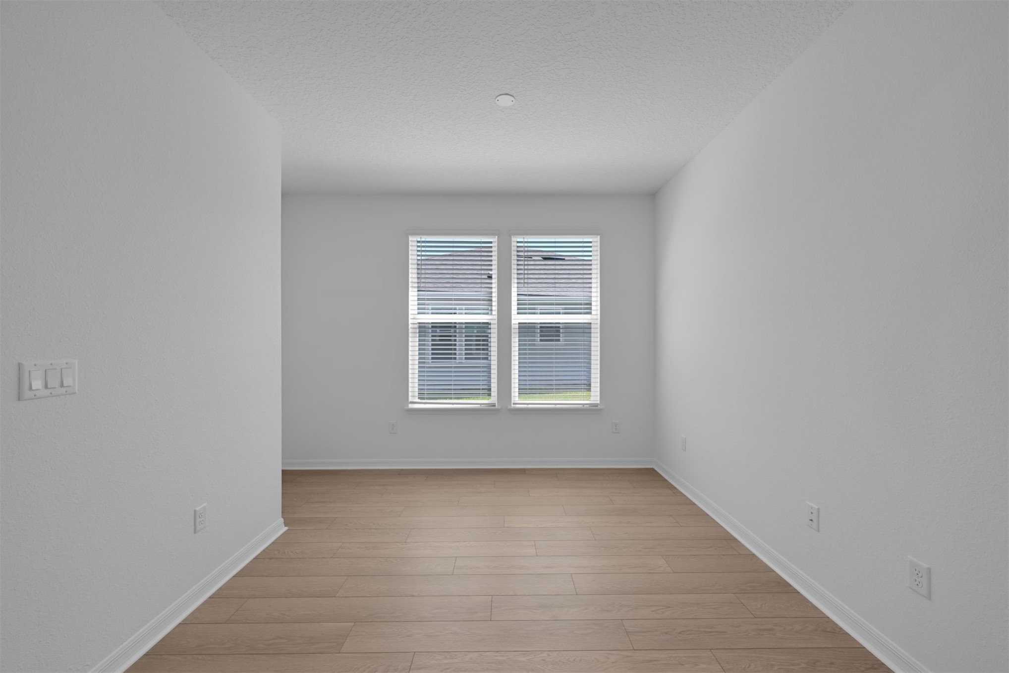 328 Ecliptic Loop Yulee, FL 32097 - Photo 21 of 41 an empty room with a window