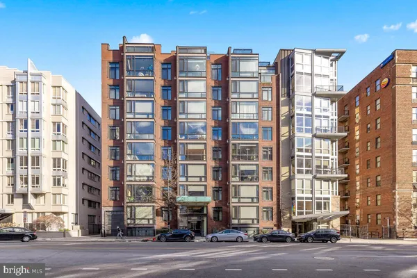 a kitchen with a stove and a microwave
