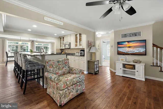 a kitchen with stainless steel appliances granite countertop a stove and a microwave