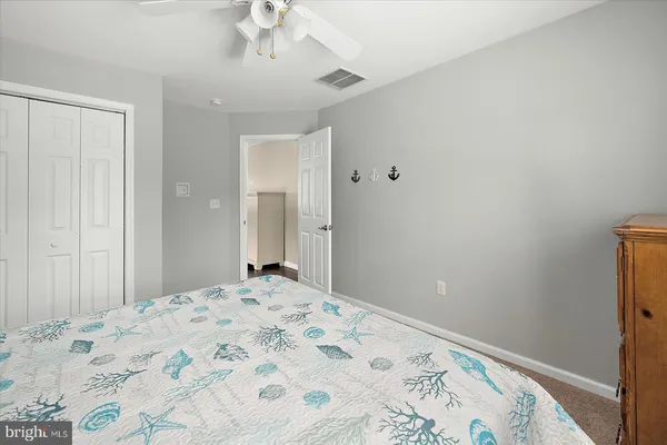 a view of storage and utility room with washer and dryer