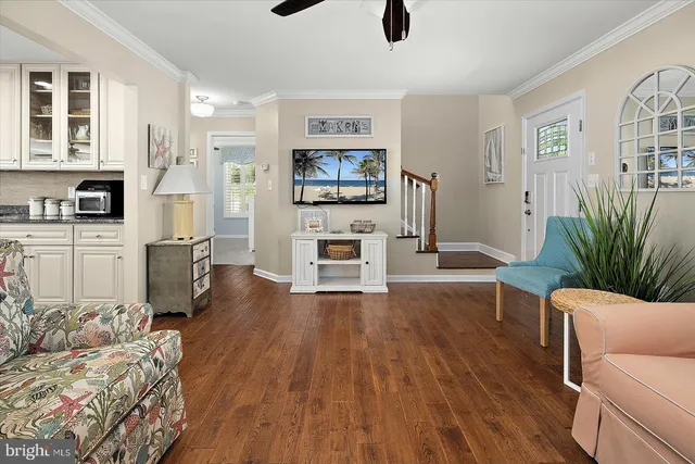 a large kitchen with stainless steel appliances granite countertop a lot of counter space and a sink