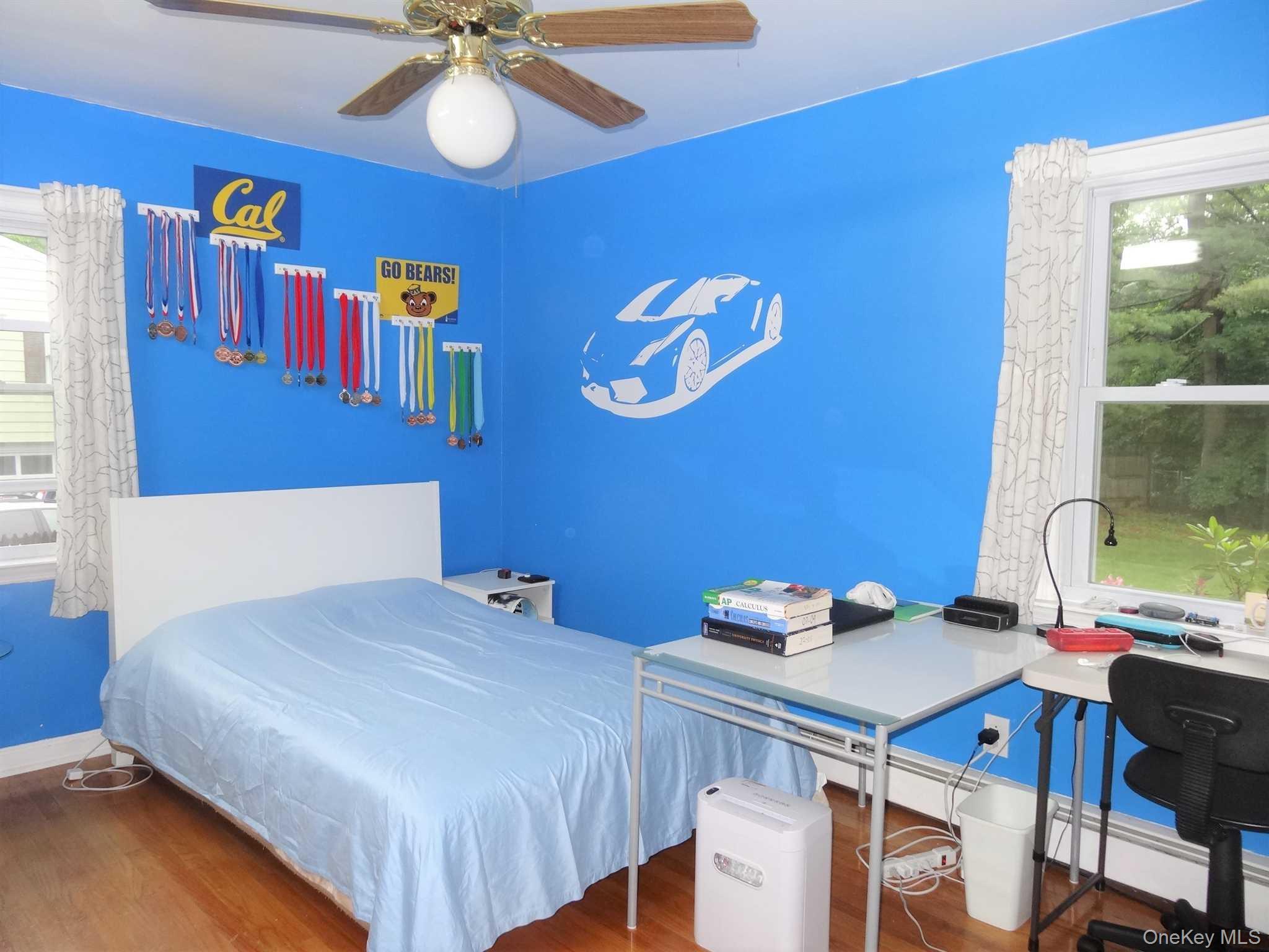 23 Pasture Lane Poughkeepsie, NY 12603 - Photo 14 of 30 a bedroom with a bed and a table with chairs