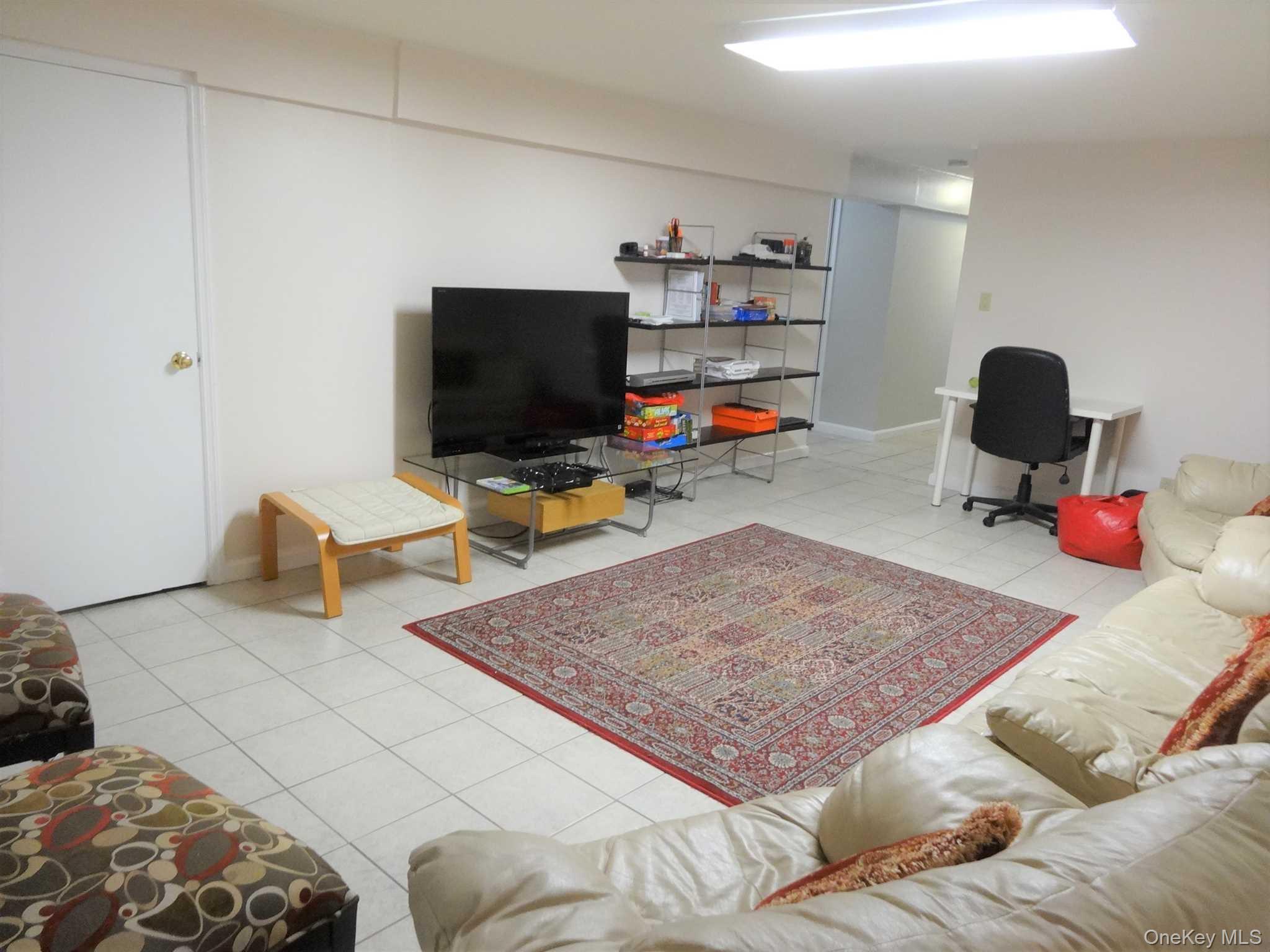 23 Pasture Lane Poughkeepsie, NY 12603 - Photo 20 of 30 a living room with furniture and a flat screen tv