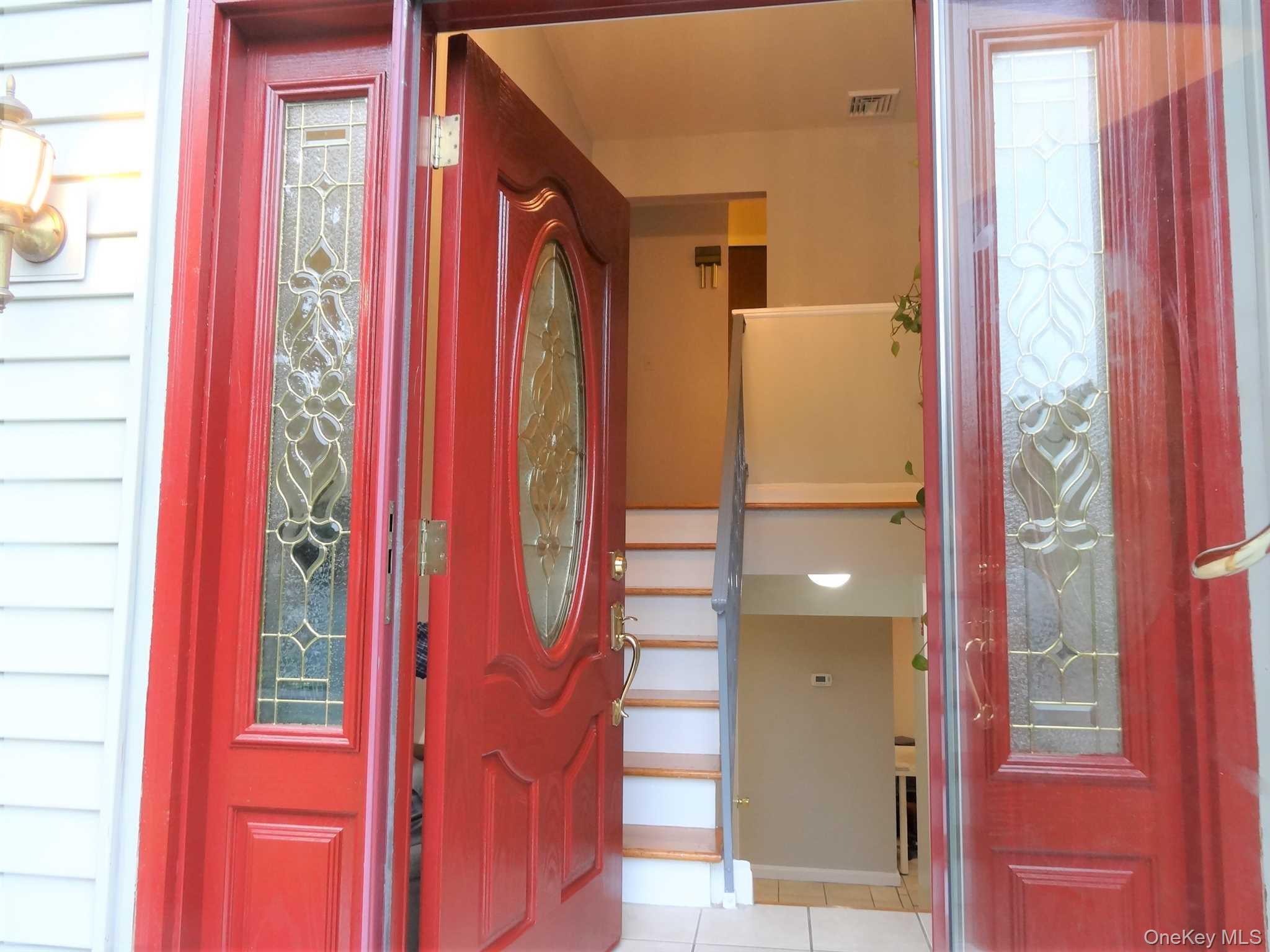 23 Pasture Lane Poughkeepsie, NY 12603 - Photo 3 of 30 a view of a bathroom with a bathtub and door