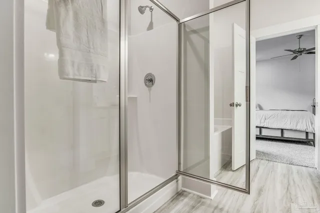 a view of a bathroom with shower