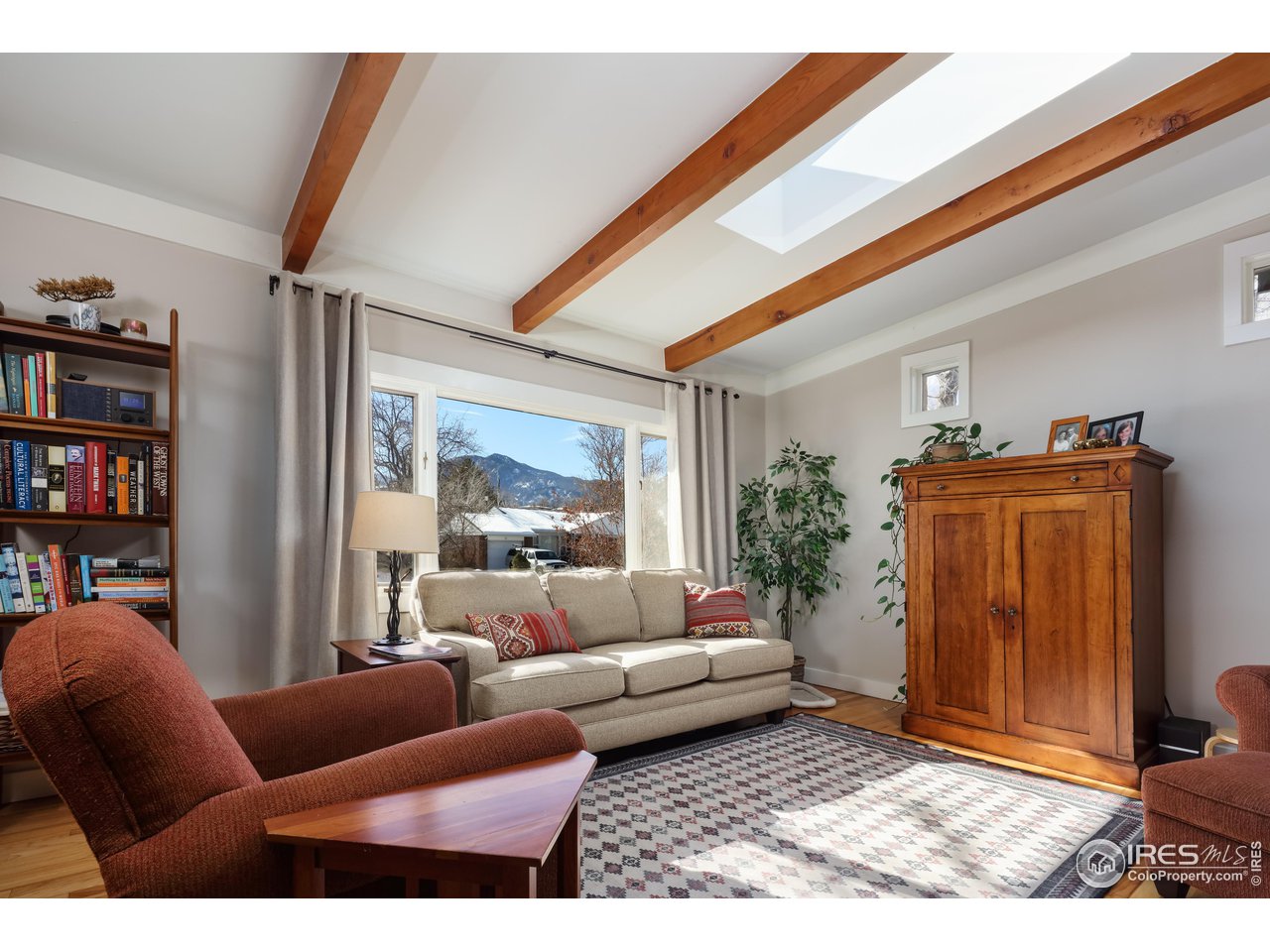 1895 Balsam Avenue Boulder, CO 80304 - Photo 14 of 40 a living room with furniture a rug and a window