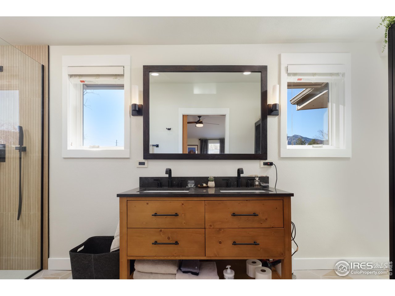 1895 Balsam Avenue Boulder, CO 80304 - Photo 20 of 40 a bathroom with a sink vanity and mirror