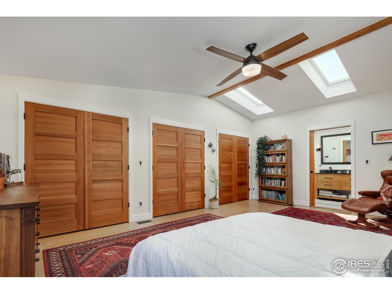 1895 Balsam Avenue Boulder, CO 80304 - Photo 22 of 40 a bedroom with a bed and a closet