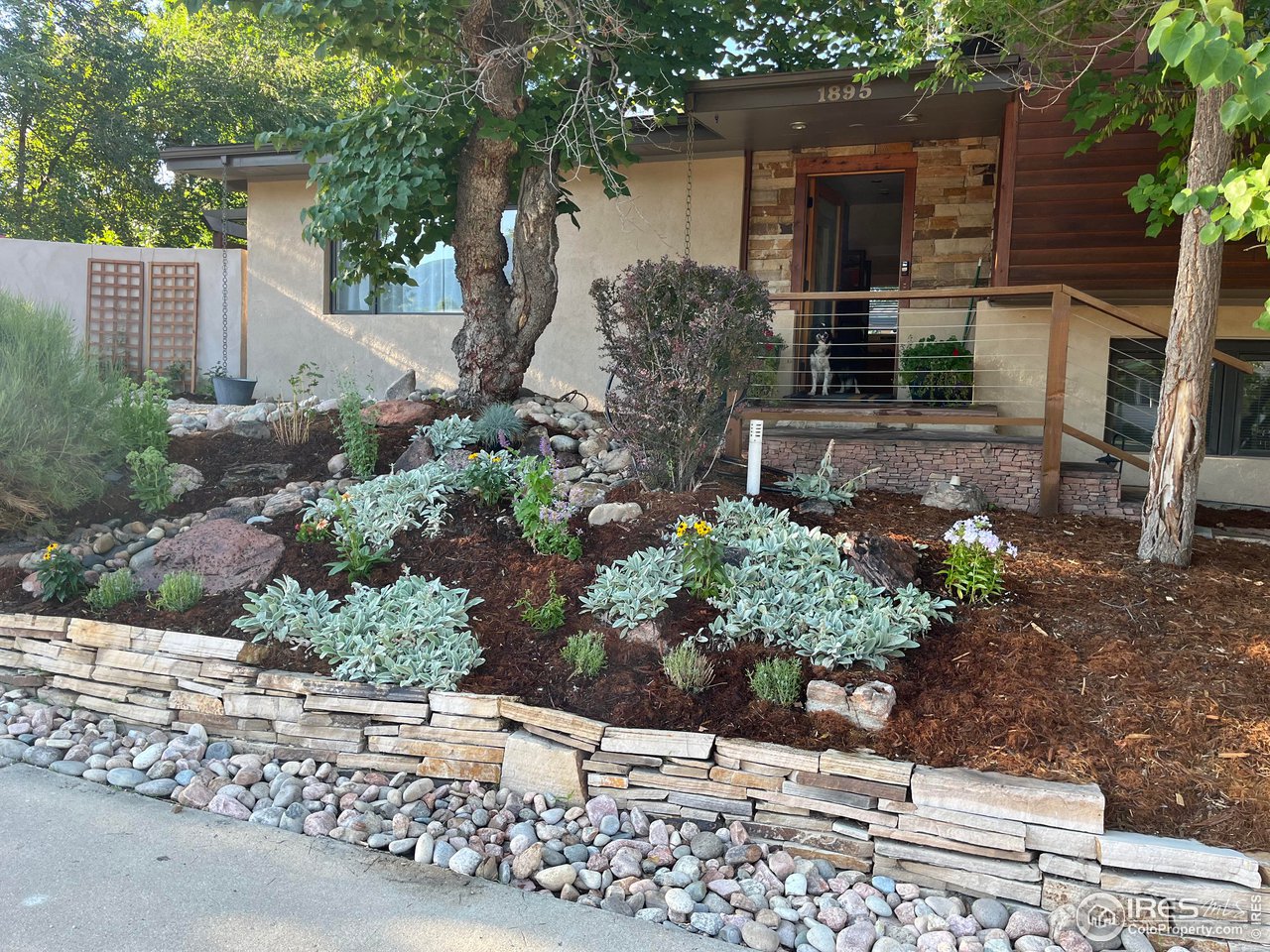 1895 Balsam Avenue Boulder, CO 80304 - Photo 33 of 40 a front view of a house with a yard