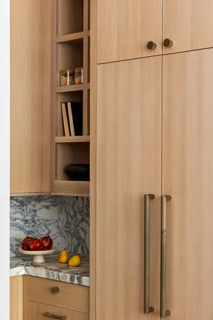 a kitchen with a stove and cabinets