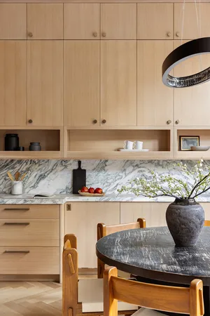 a kitchen with a sink cabinets and window
