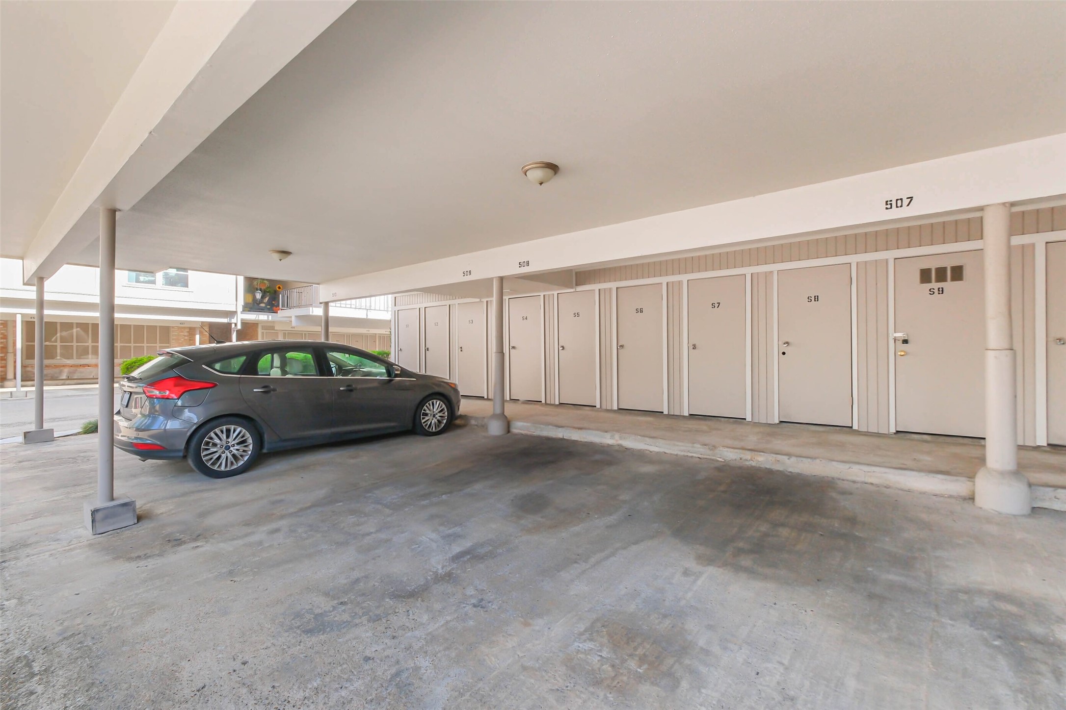 2230 South Piney Point Road, Unit 113 Houston, TX 77063 - Photo 20 of 28 This unit has one assigned carport space #507.