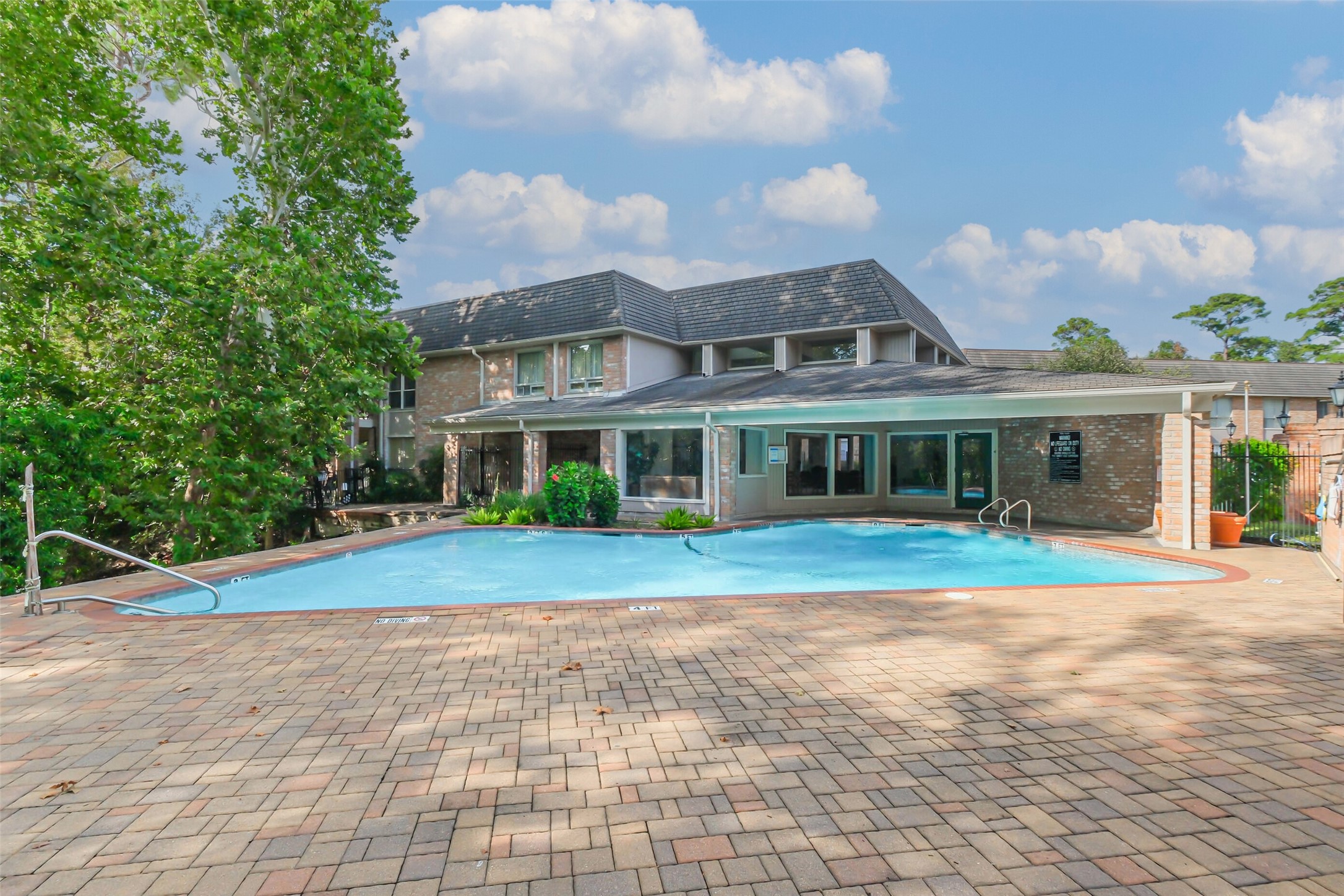 2230 South Piney Point Road, Unit 113 Houston, TX 77063 - Photo 22 of 28 Enjoy relaxing in the community pool during Houston's hot summers!