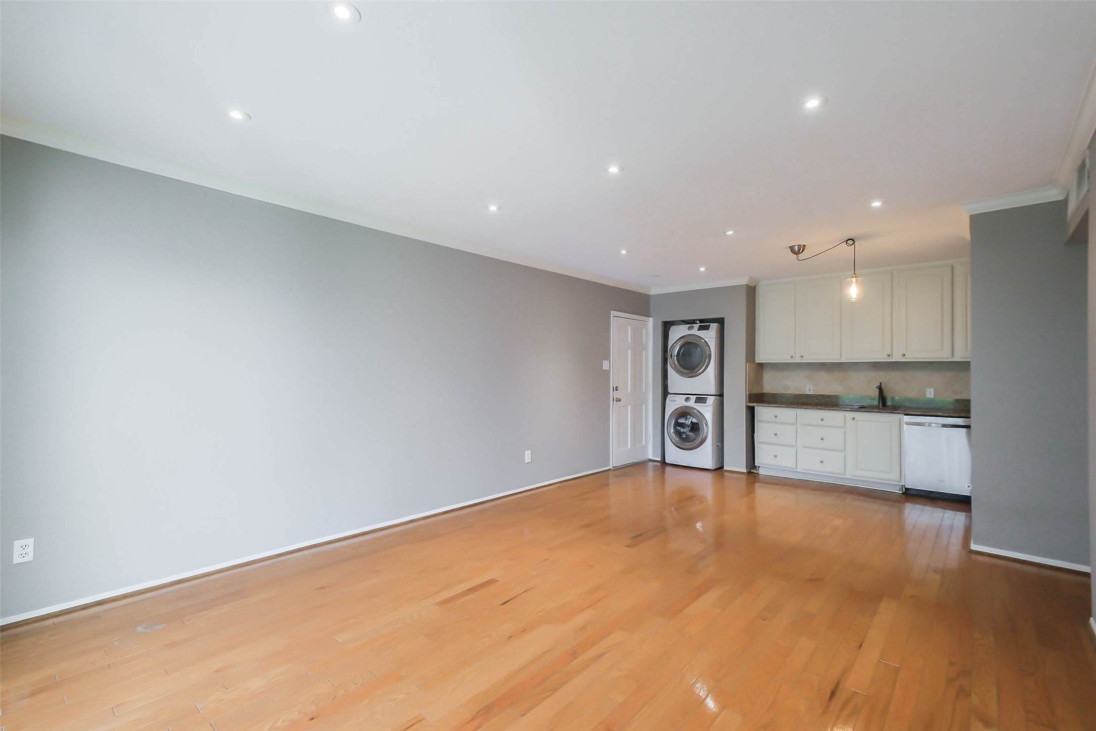 2230 South Piney Point Road, Unit 113 Houston, TX 77063 - Photo 6 of 28 From this angle of the living room you can see that the kitchen is open to the living room.