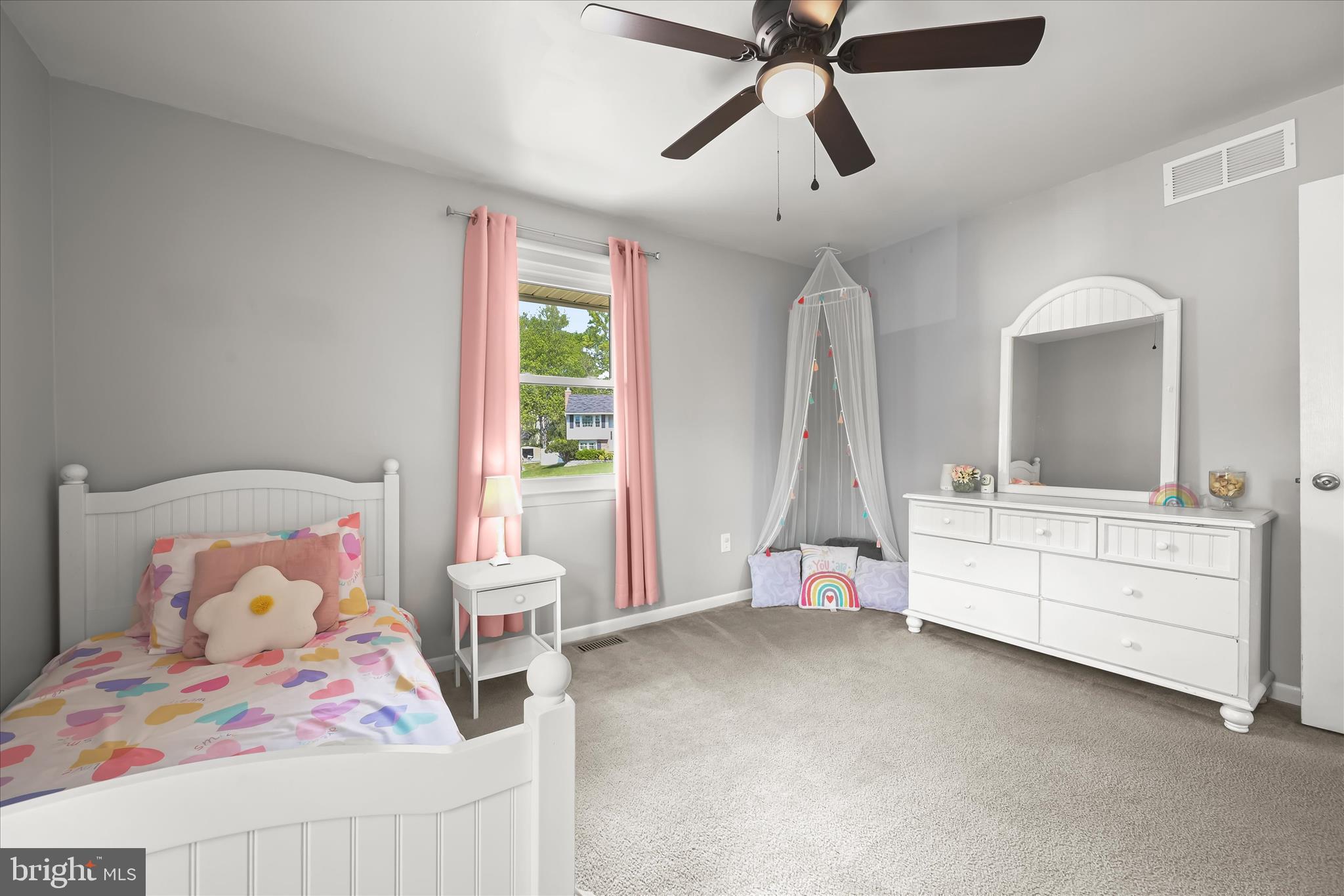 7533 Lemon Tree Court Hanover, MD 21076 - Photo 16 of 38 a bedroom with a bed and a chandelier