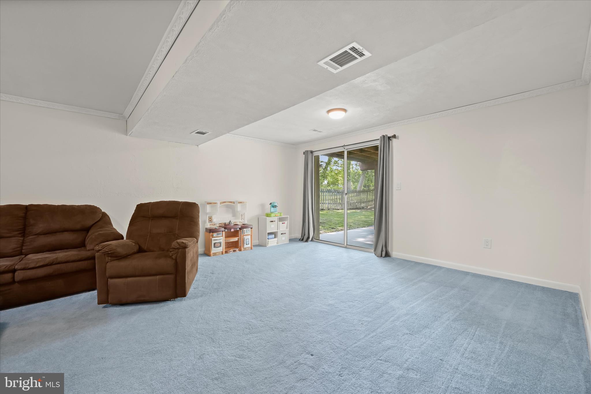 7533 Lemon Tree Court Hanover, MD 21076 - Photo 23 of 38 a living room with furniture and a window