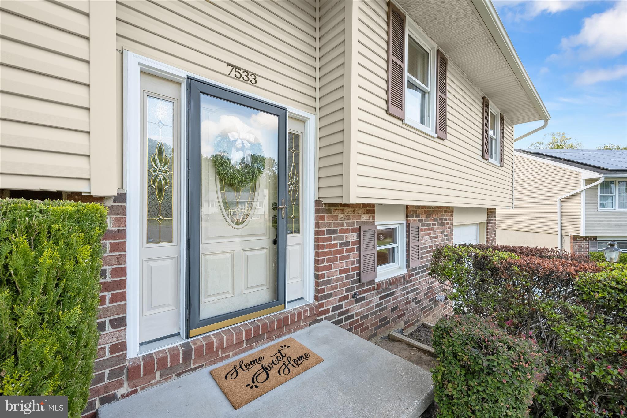 7533 Lemon Tree Court Hanover, MD 21076 - Photo 27 of 38 front view of a house with a porch