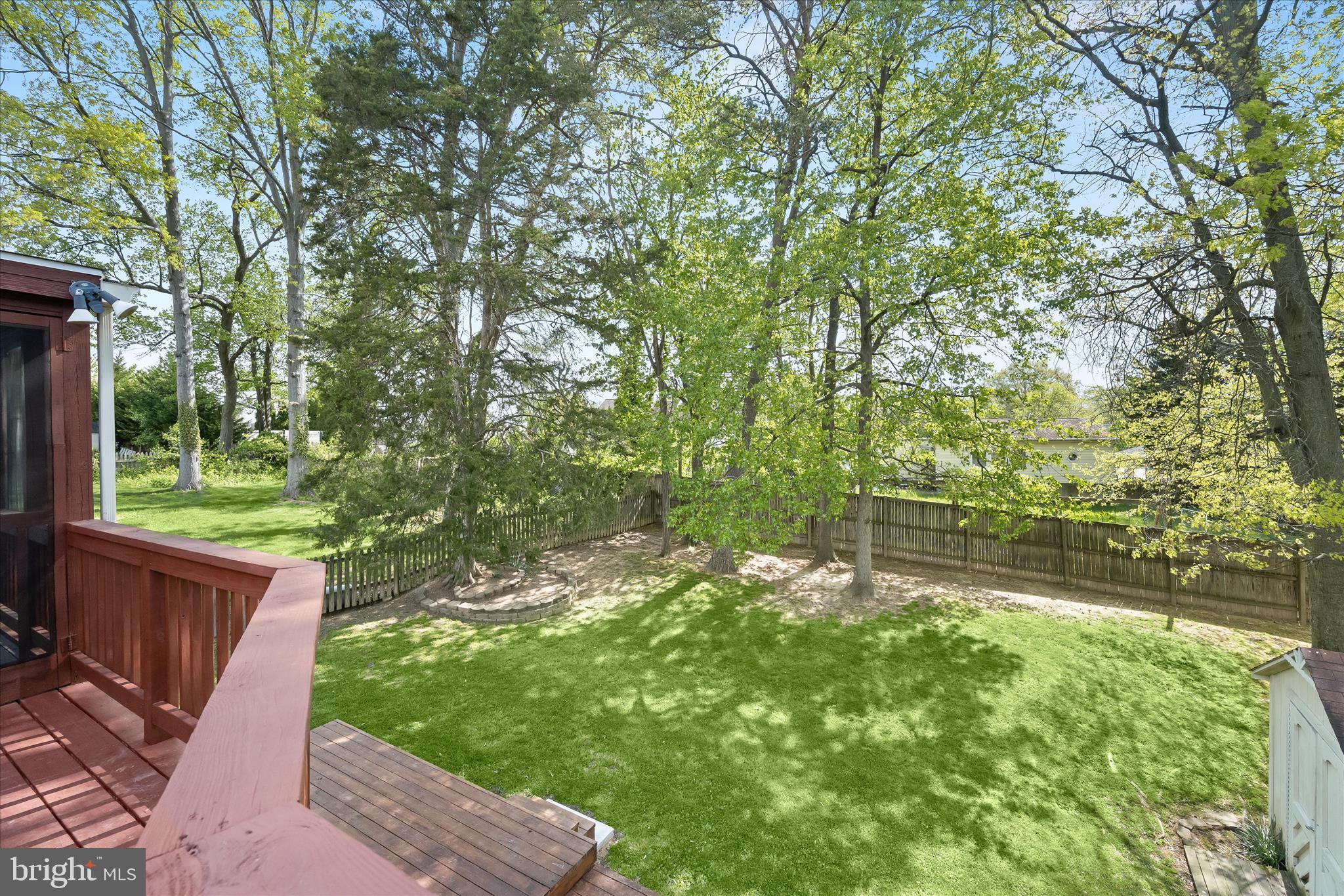 7533 Lemon Tree Court Hanover, MD 21076 - Photo 30 of 38 a backyard of a house with lots of green space