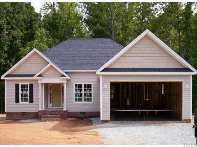 2 Younger Road Roxboro, NC 27573 - Photo 1 of 1 a view of a house with a yard