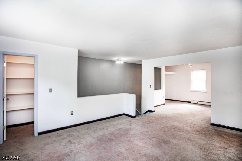 1130 Valley Road, Unit 2B Wayne, NJ 07470 - Photo 6 of 47 a view of an empty room with a window