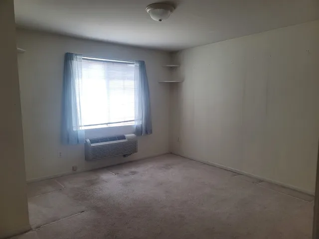 an empty room with a window