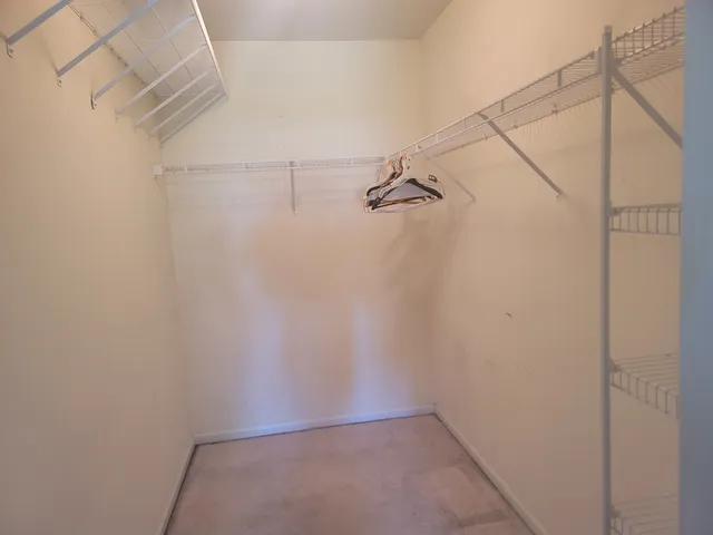 a view of a room with racks on the wall