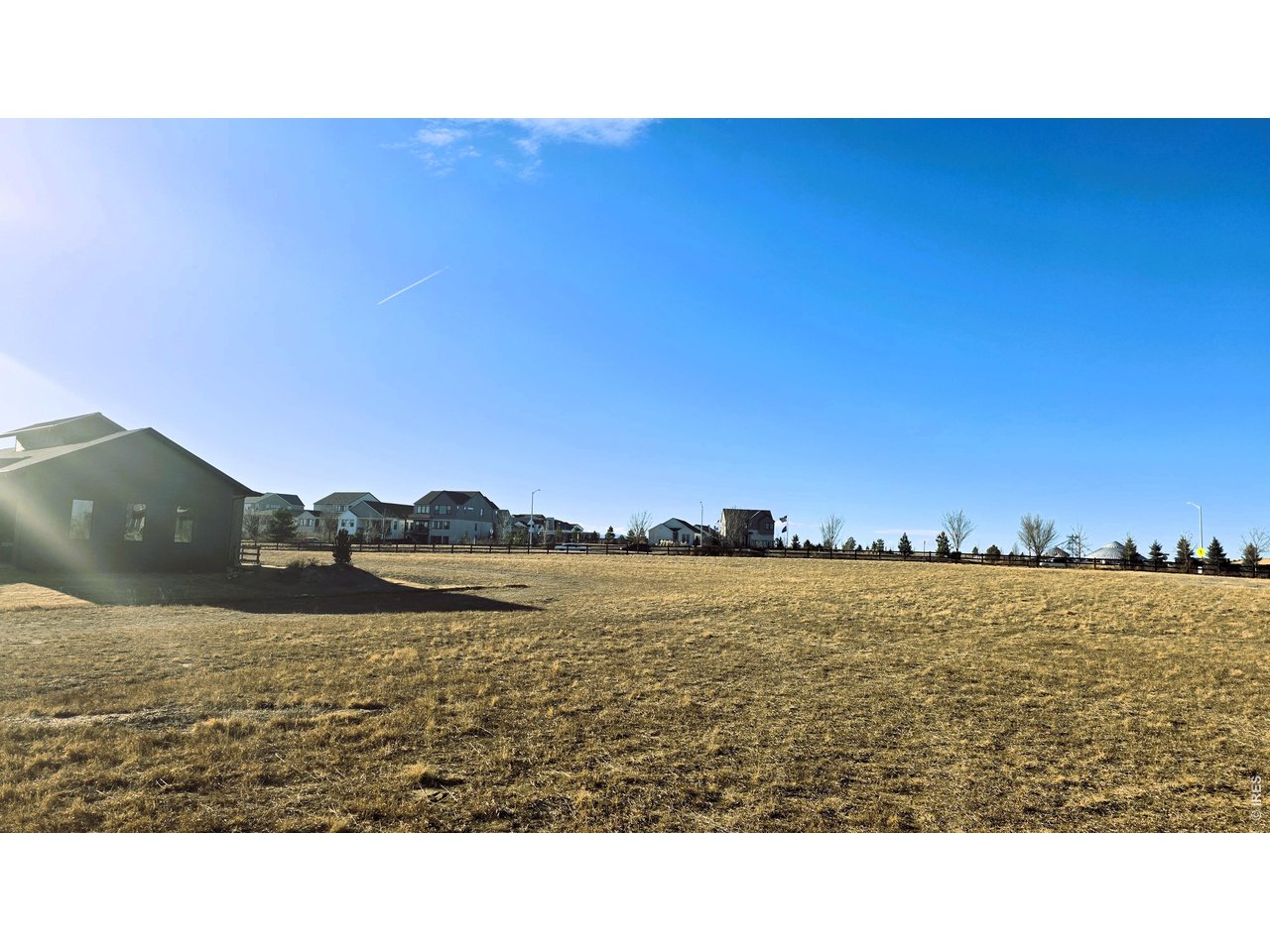 1508 Flowering Tree Court Windsor, CO 80550 - Photo 5 of 7 View at home and lot on west side.